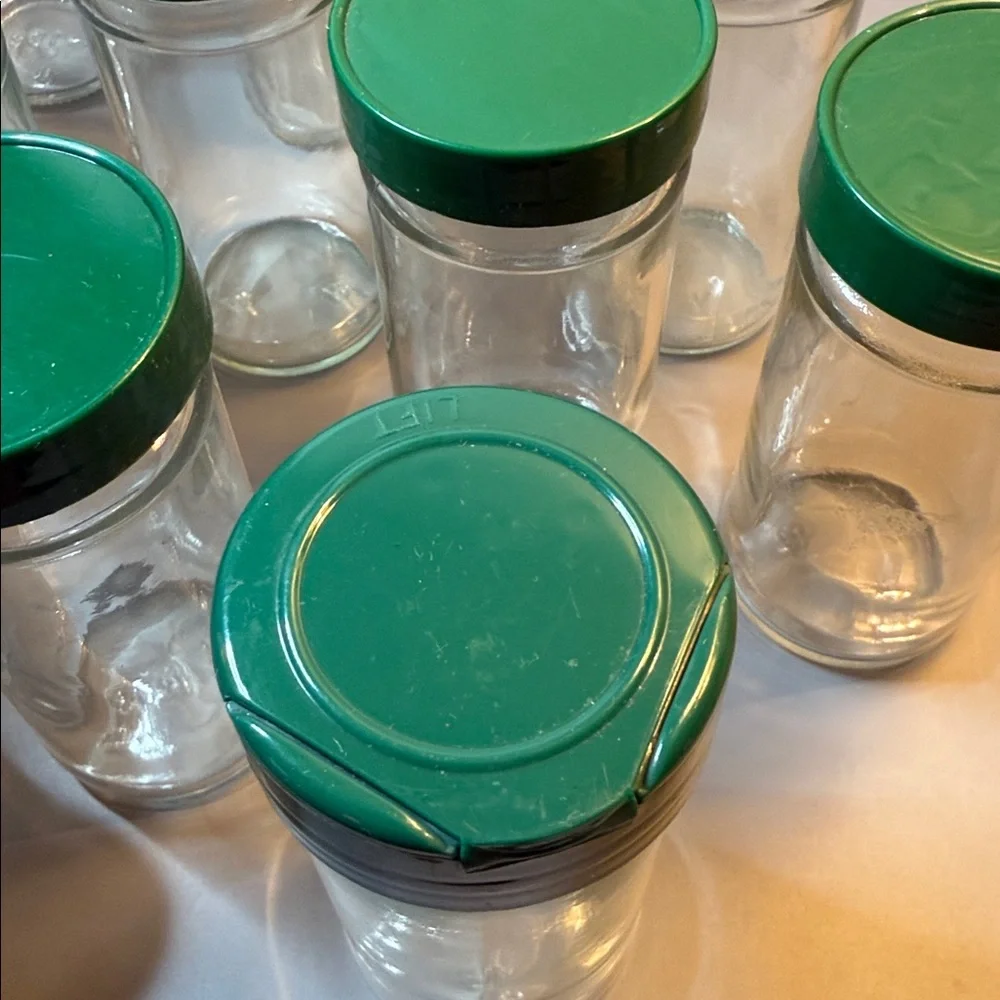 Set of 12 Vintage Glass Round Spice Jars W/ Green Lids, Approximately 4.5” Tall - Picture 8 of 8
